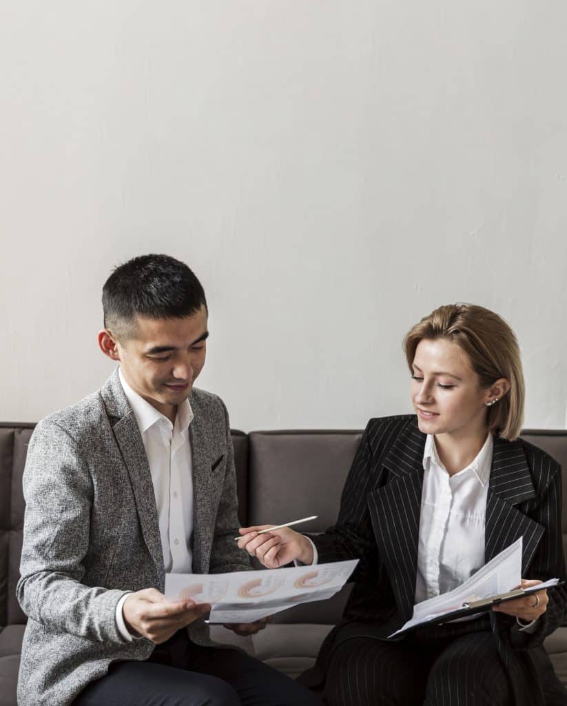 two people discussing some business