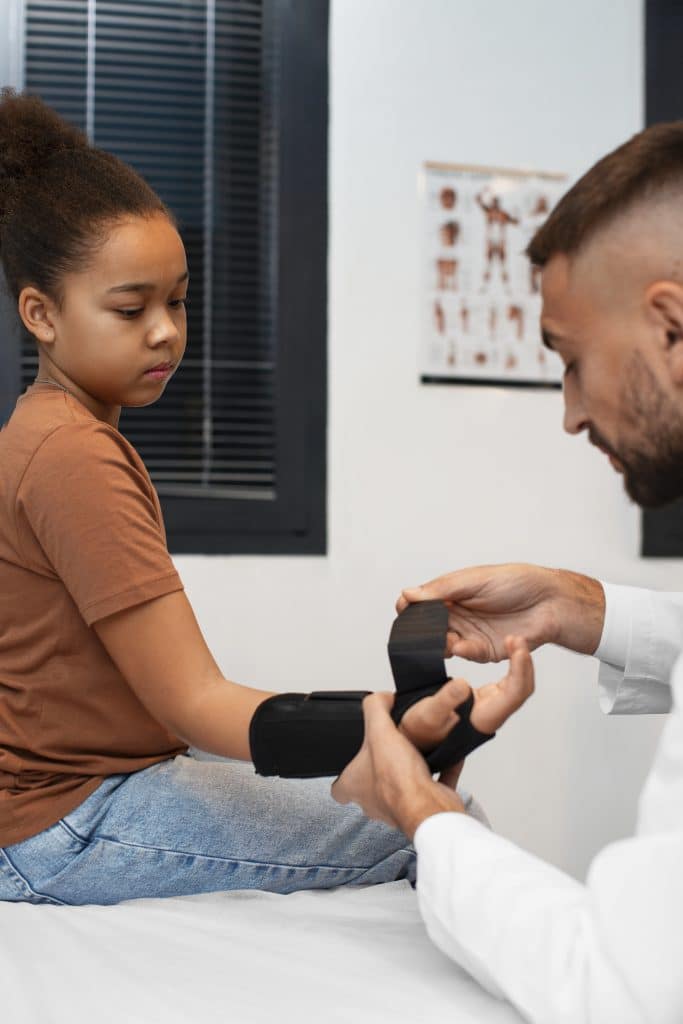 doctor taking care afro-american child